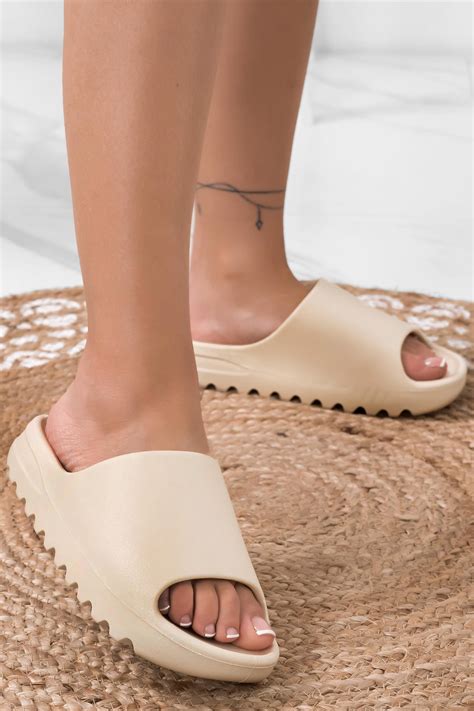 Ciabatte in gomma con platform in Beige .